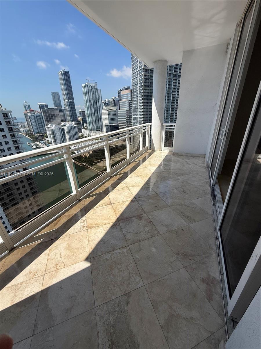 901 Brickell Key Boulevard, Unit 3102 Miami, FL 33131 - Photo 16 of 56 a view of a kitchen with a sink