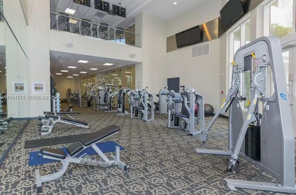 a view of a room with gym equipment