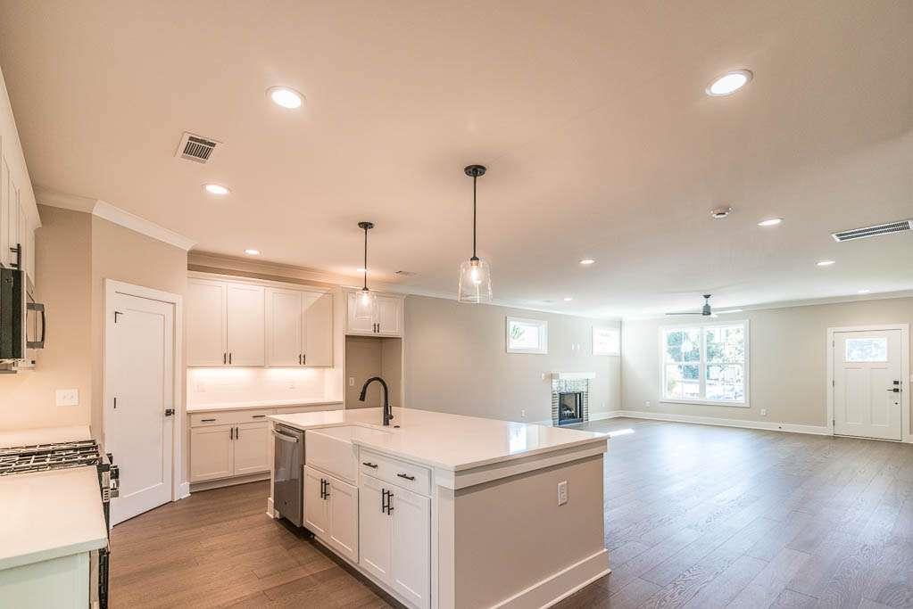 2462 Waldrop Ridge Court Decatur, GA 30034 - Photo 7 of 20 a kitchen with a stove a sink and a refrigerator