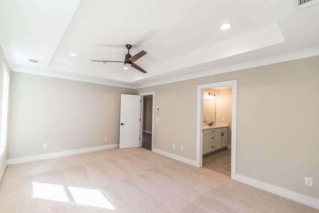 2462 Waldrop Ridge Court Decatur, GA 30034 - Photo 9 of 20 a view of a livingroom with a ceiling fan & entryway