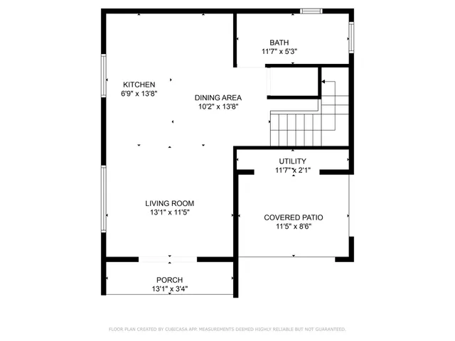 a picture of a bench in front of a wall