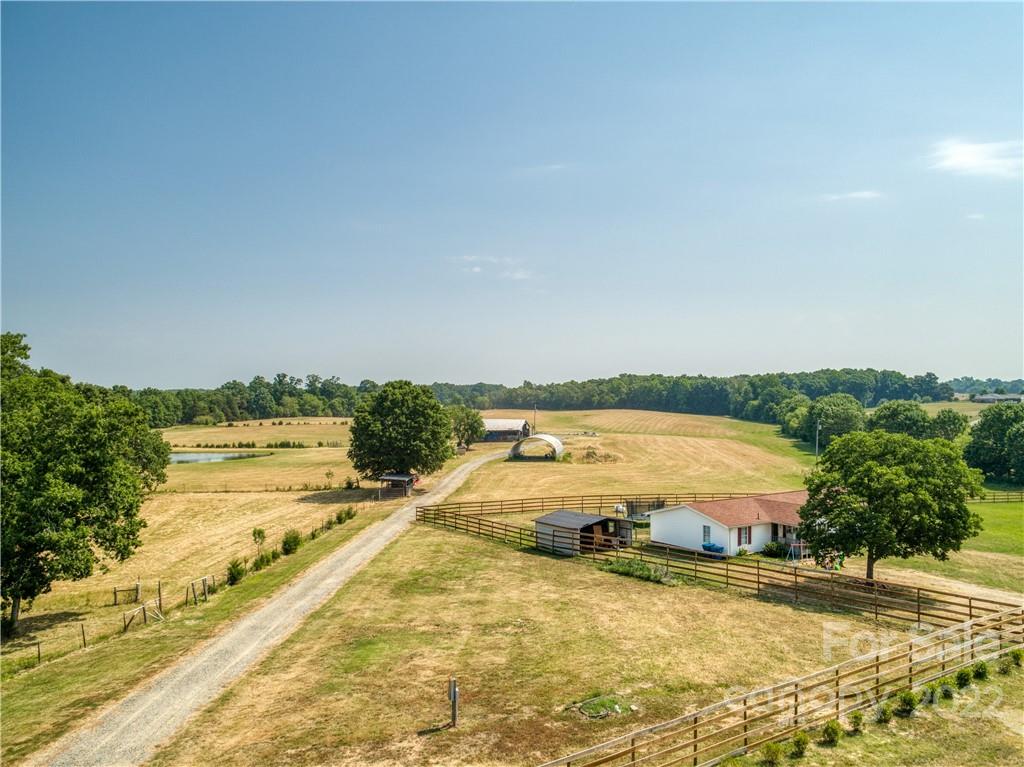 8681 Mauney Road Mount Pleasant, NC 28124 - Photo 11 of 46 a view of a swimming pool and an ocean view