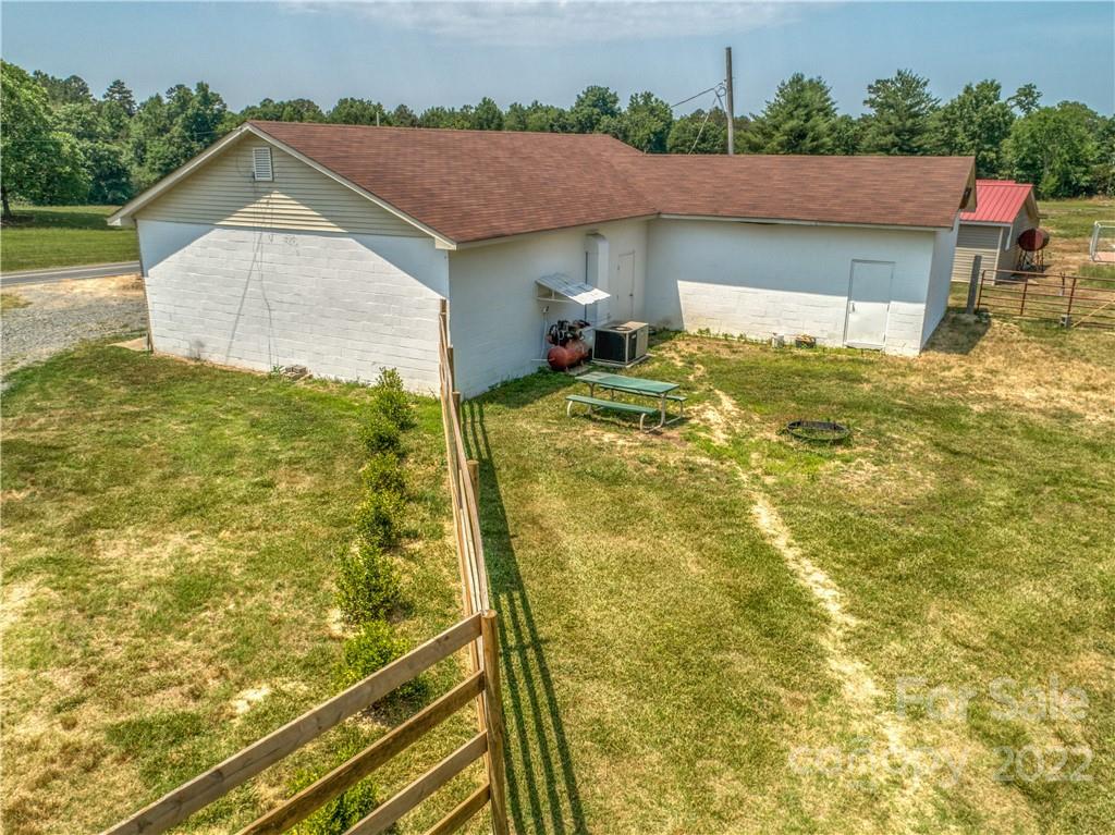 8681 Mauney Road Mount Pleasant, NC 28124 - Photo 13 of 46 a house view with a outdoor space