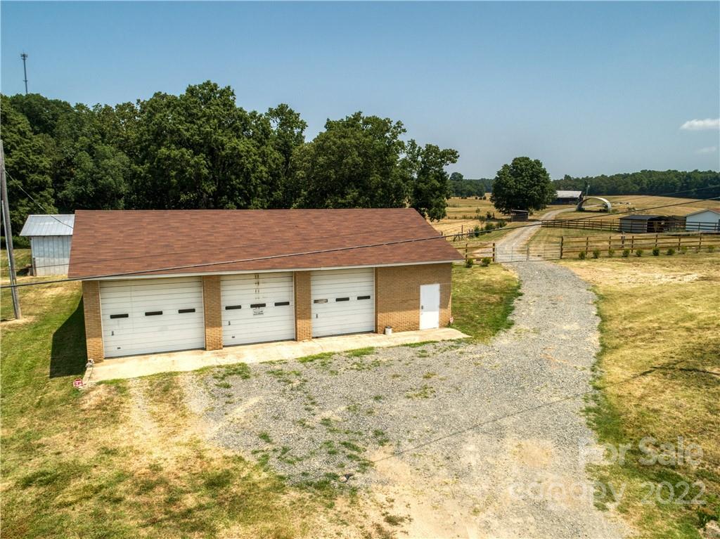 8681 Mauney Road Mount Pleasant, NC 28124 - Photo 2 of 46 a backyard of a house