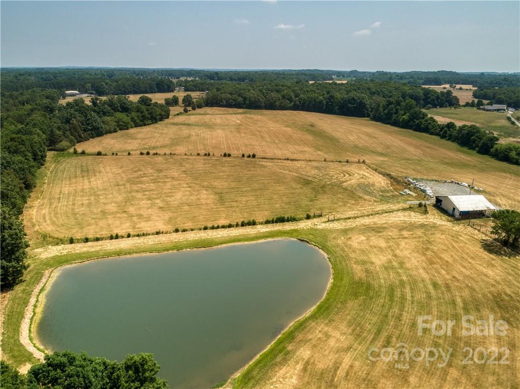 8681 Mauney Road Mount Pleasant, NC 28124 - Photo 25 of 46 a view of an outdoor space and a lake view