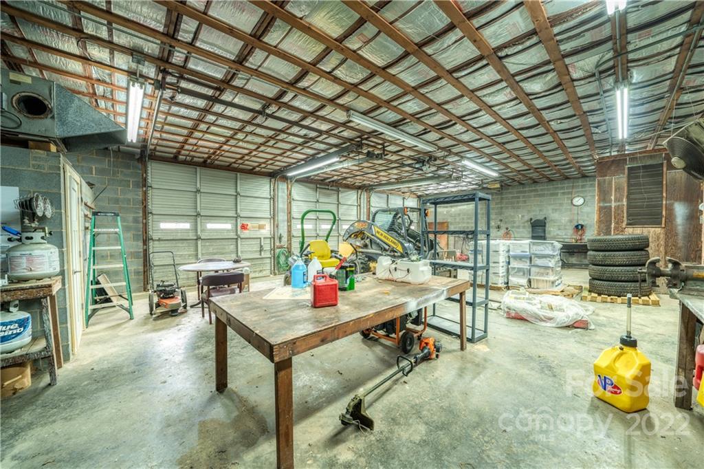 8681 Mauney Road Mount Pleasant, NC 28124 - Photo 37 of 46 a outdoor space with lots of glass windows