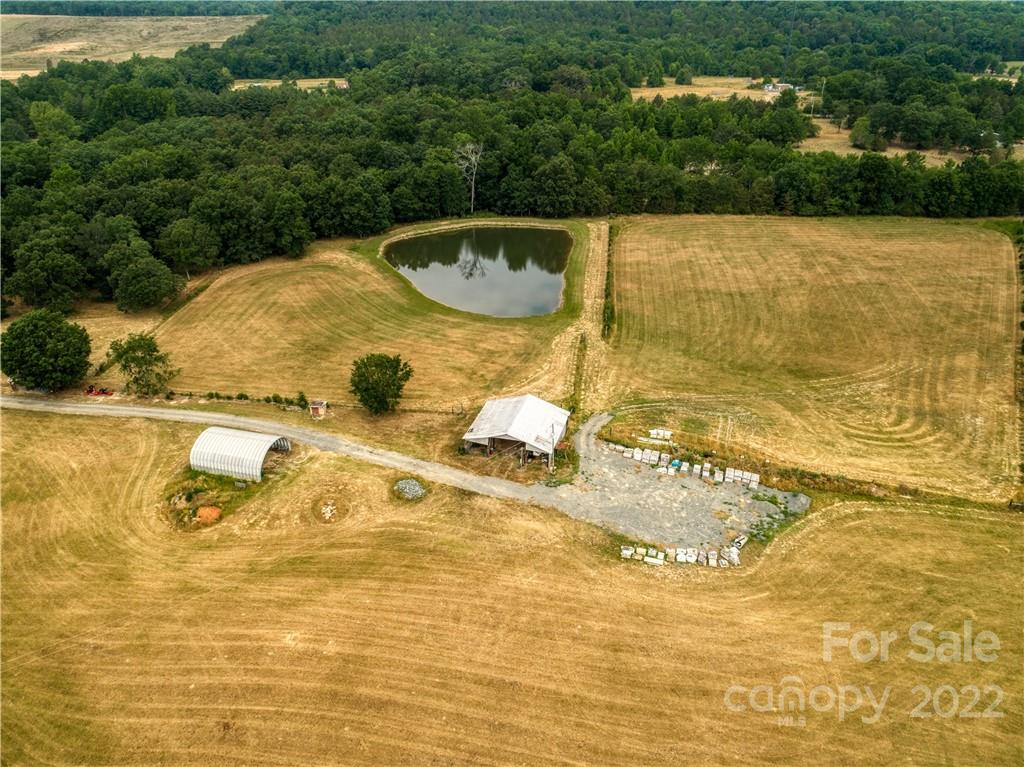 8681 Mauney Road Mount Pleasant, NC 28124 - Photo 5 of 46 a view of a swimming pool with an outdoor space