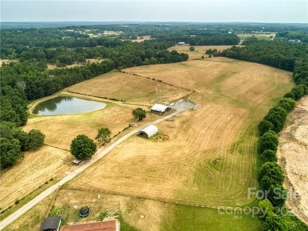 8681 Mauney Road Mount Pleasant, NC 28124 - Photo 8 of 46 a view of a lake with a big yard