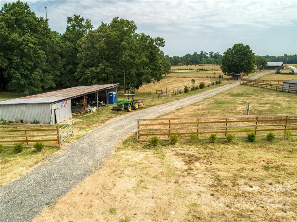 8681 Mauney Road Mount Pleasant, NC 28124 - Photo 10 of 46 a swimming pool with an outdoor seating