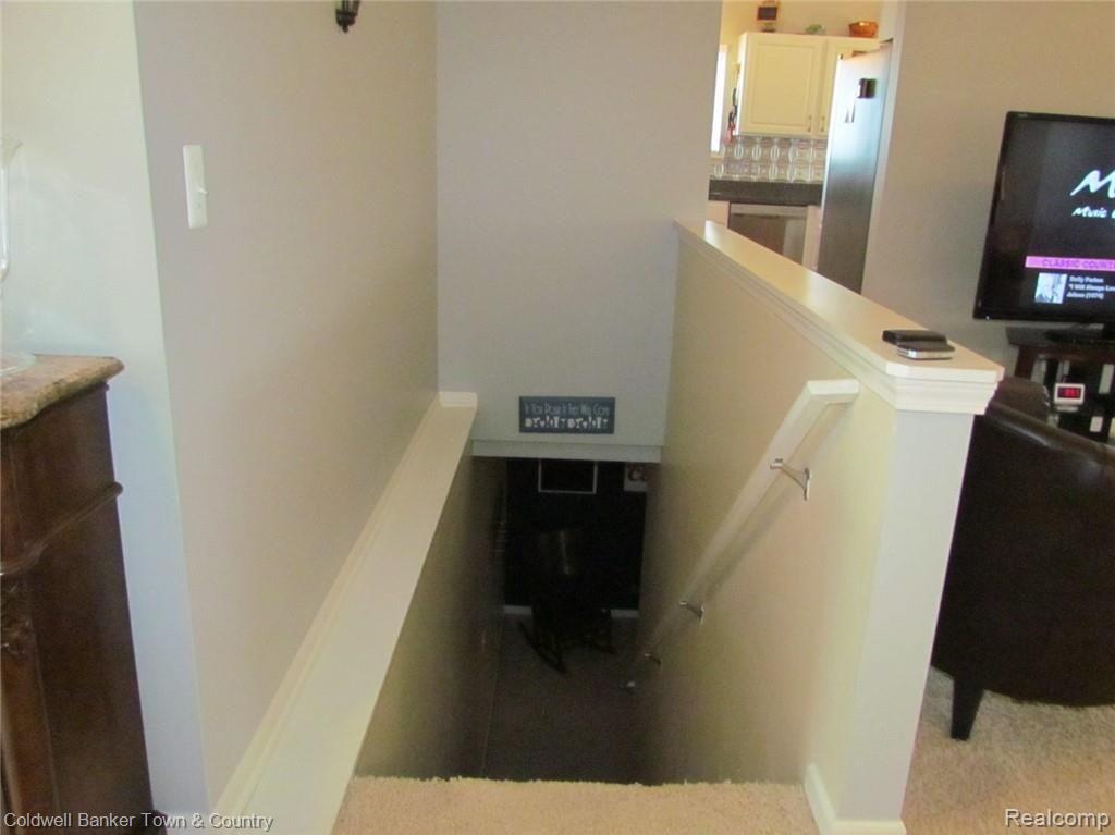 845 Dewars Street Howell, MI 48843 - Photo 21 of 36 Staircase to finished basement