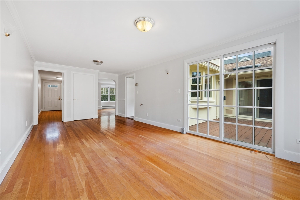 14 Somerset Road Lexington, MA 02420 - Photo 11 of 42 a view of empty room with wooden floor and fan