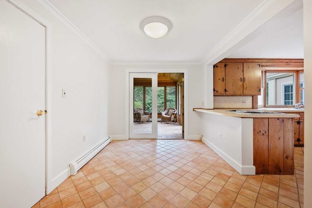 14 Somerset Road Lexington, MA 02420 - Photo 15 of 42 a view of a kitchen with wooden floor and a window