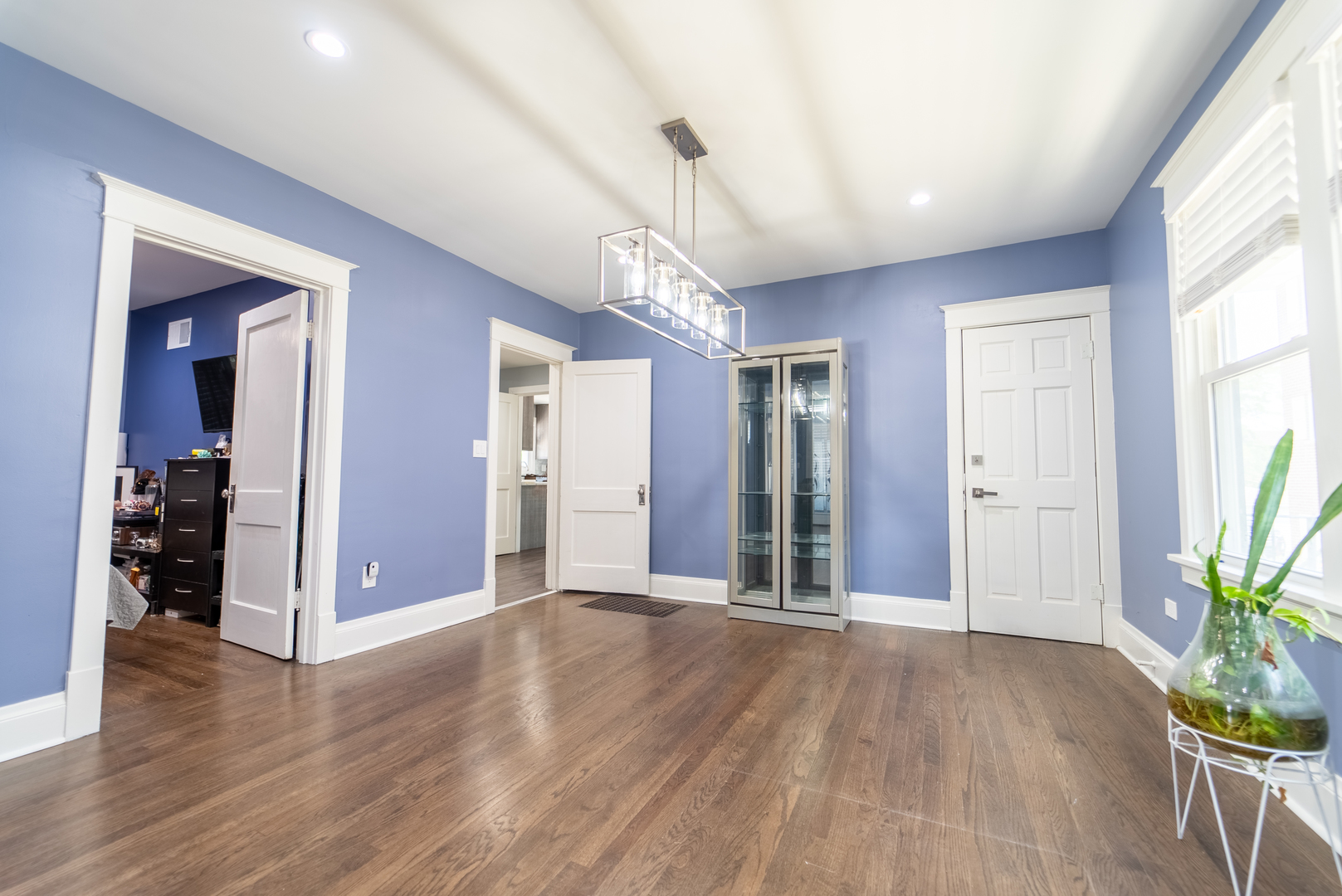 118 East North Avenue Addison, IL 60101 - Photo 11 of 50 a view of a hallway with wooden floor and a window