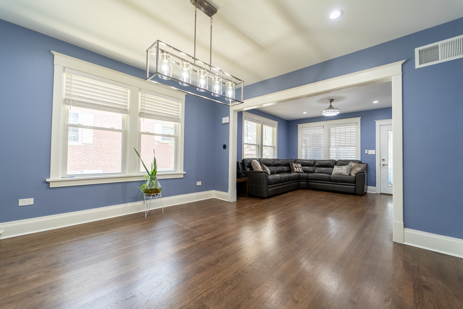 118 East North Avenue Addison, IL 60101 - Photo 14 of 50 a living room with furniture and a chandelier