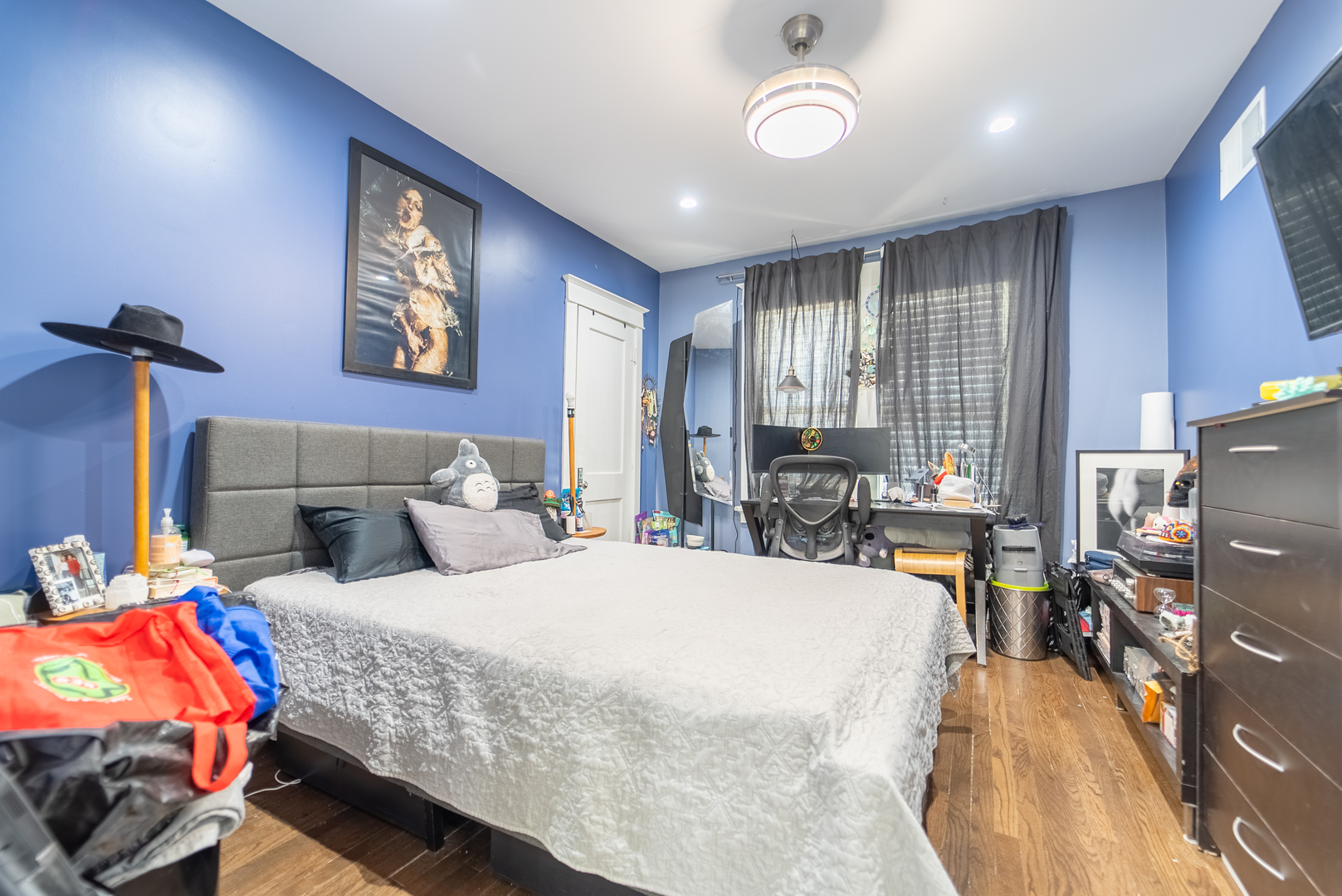 118 East North Avenue Addison, IL 60101 - Photo 24 of 50 a bedroom with furniture and a chandelier