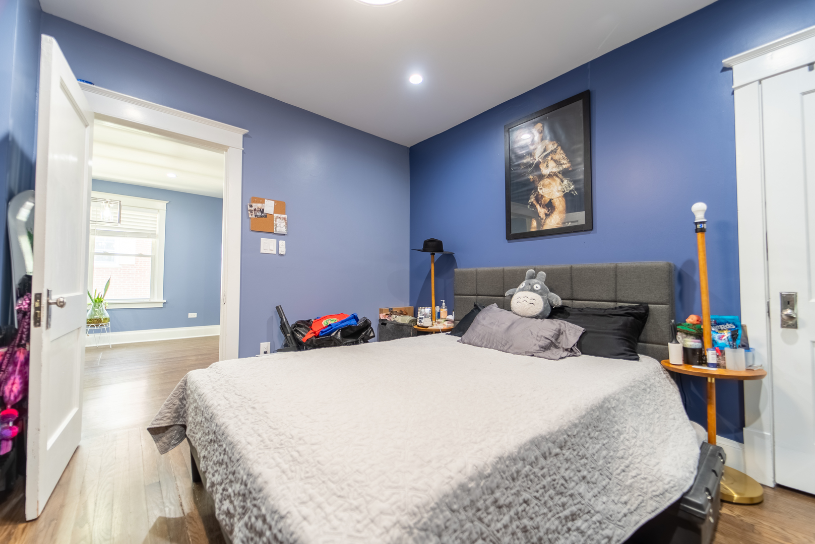 118 East North Avenue Addison, IL 60101 - Photo 25 of 50 a bedroom with bed and a chandelier