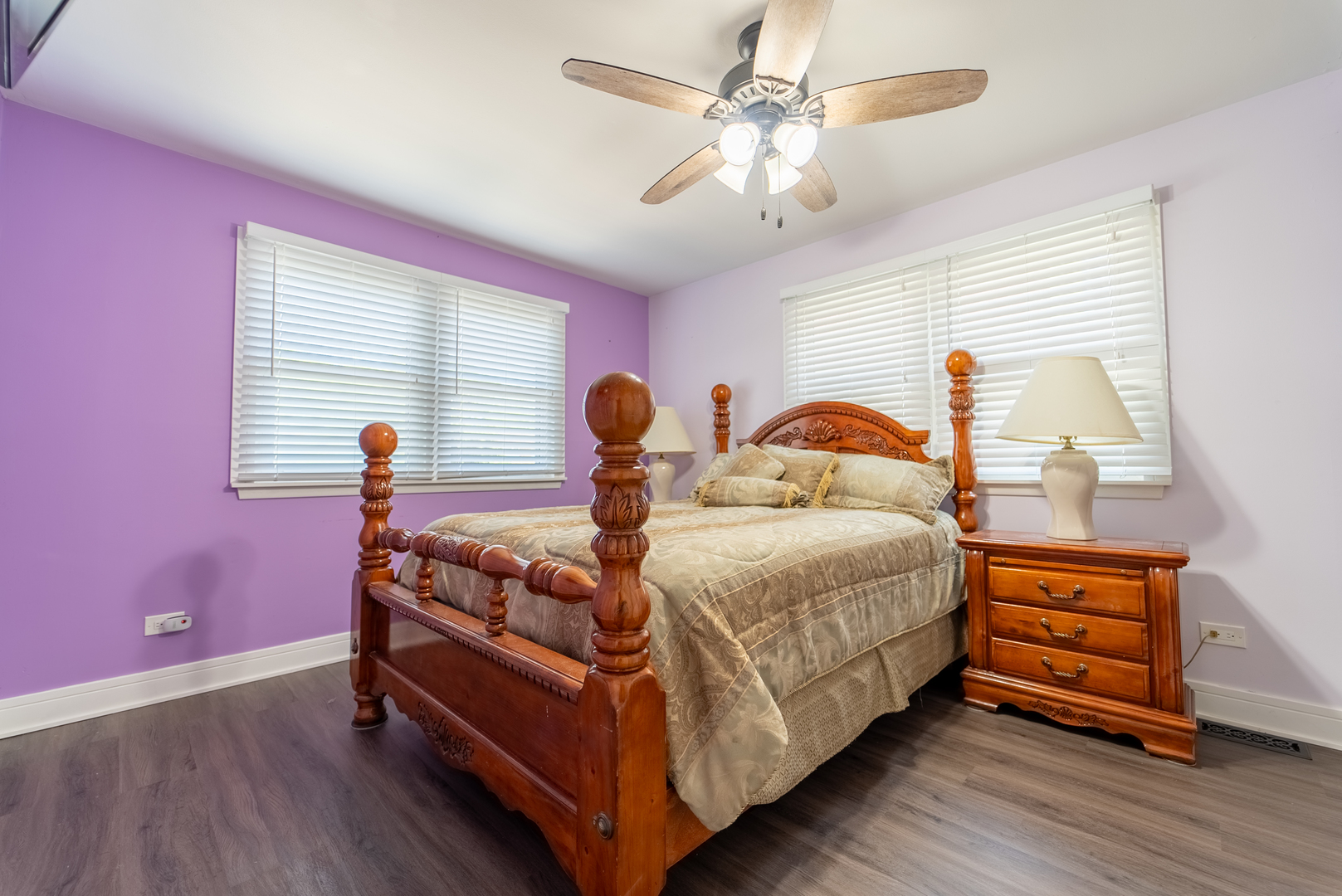 118 East North Avenue Addison, IL 60101 - Photo 27 of 50 a bedroom with a bed and a chandelier