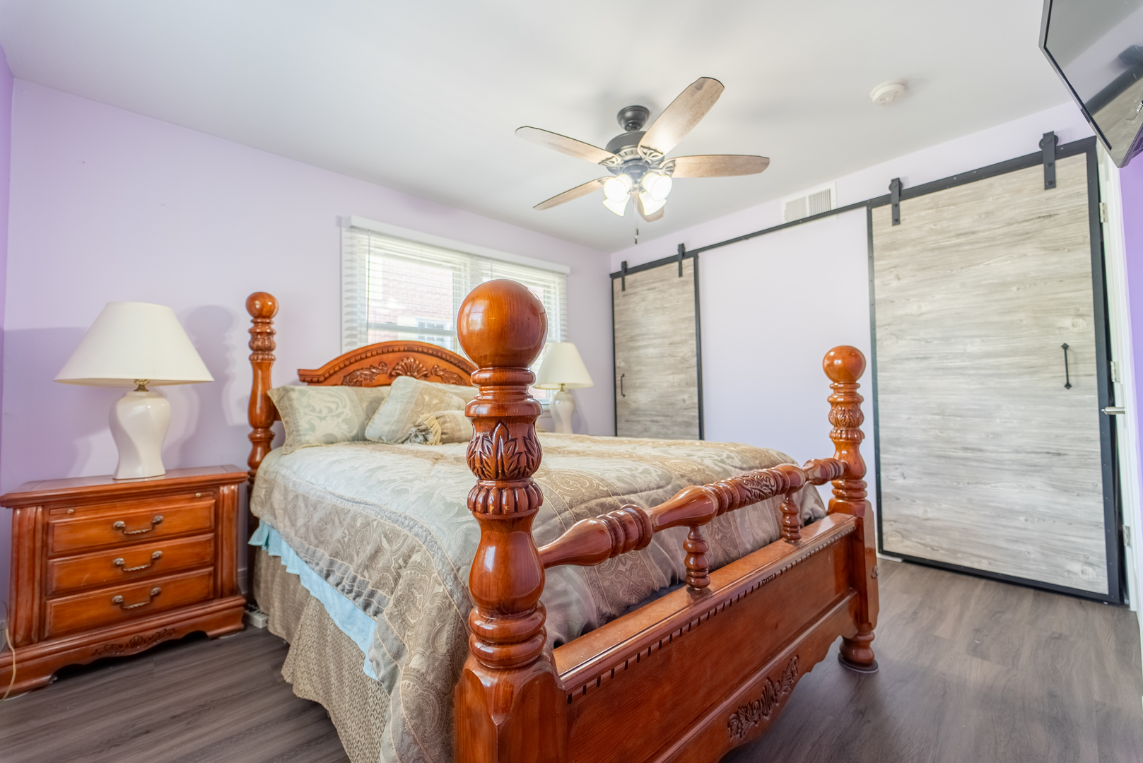 118 East North Avenue Addison, IL 60101 - Photo 28 of 50 a bedroom with a bed and wooden floor