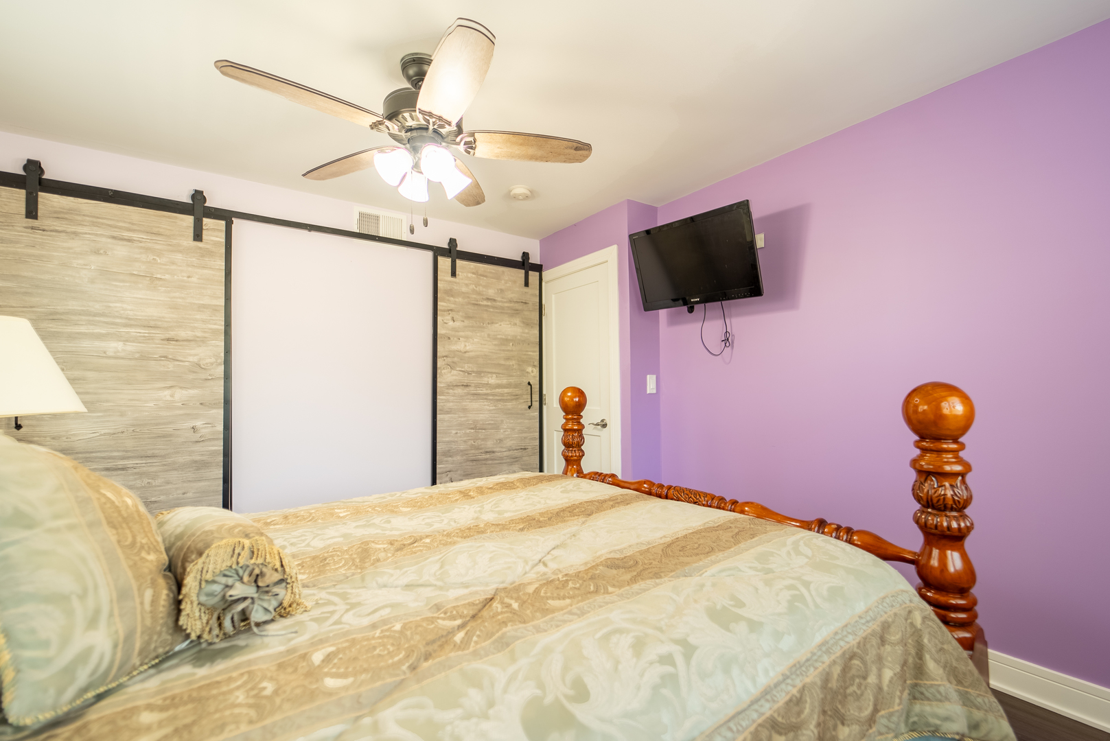 118 East North Avenue Addison, IL 60101 - Photo 29 of 50 a bedroom with a bed and a flat screen tv