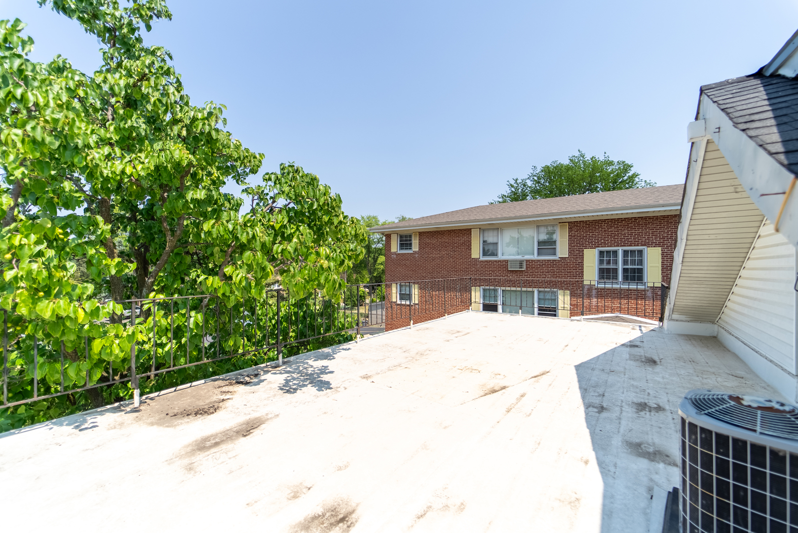 118 East North Avenue Addison, IL 60101 - Photo 41 of 50 a front view of a house with a garden