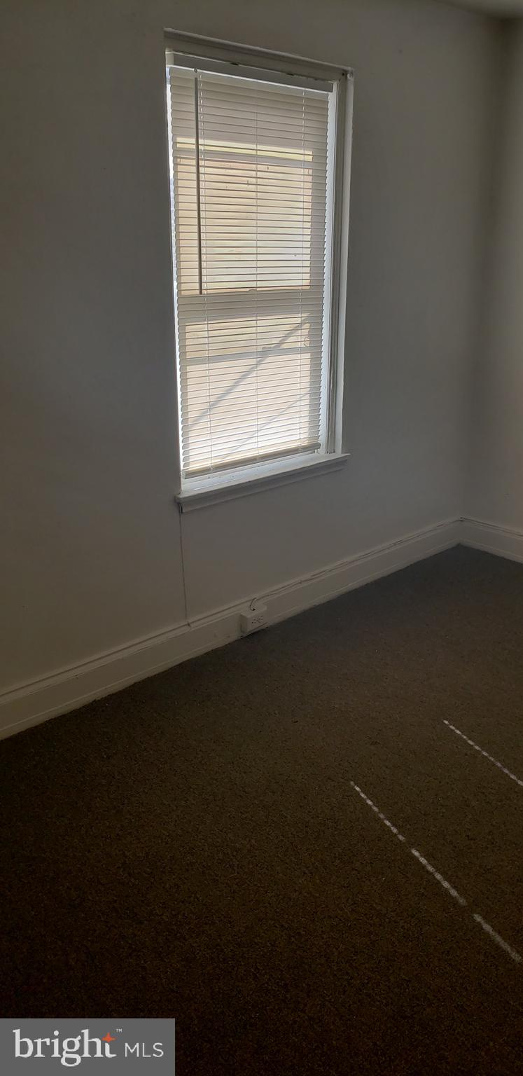 3054 Alabama Road Camden, NJ 08104 - Photo 13 of 25 an empty room with a window