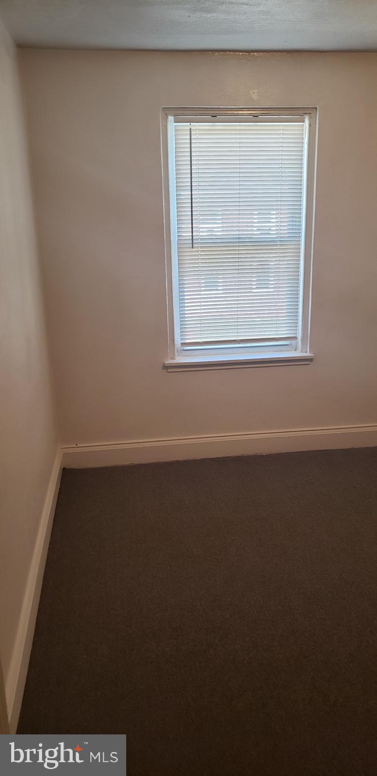 3054 Alabama Road Camden, NJ 08104 - Photo 17 of 25 an empty room with a window
