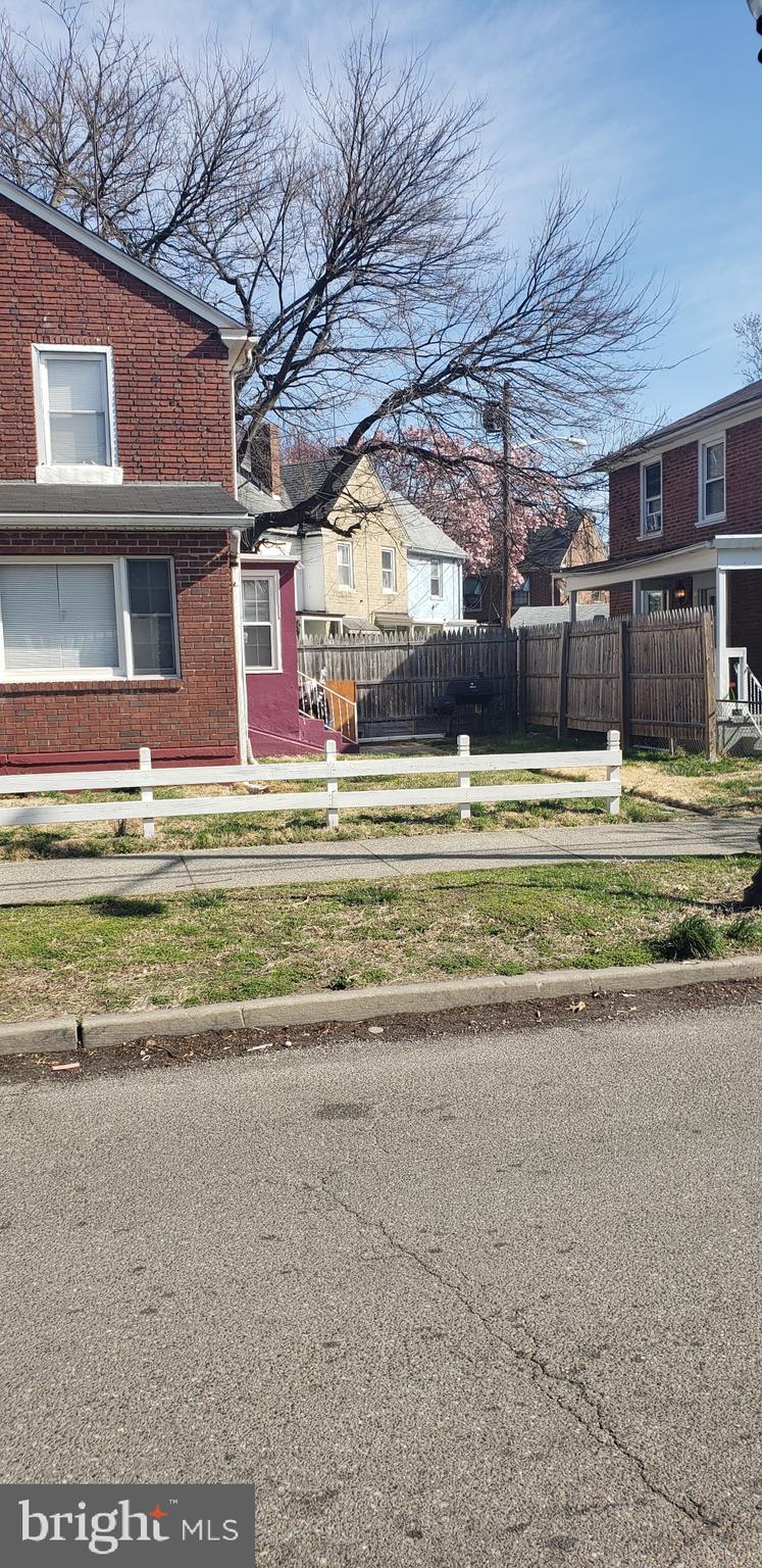 3054 Alabama Road Camden, NJ 08104 - Photo 3 of 25 a view of a swimming pool with a yard