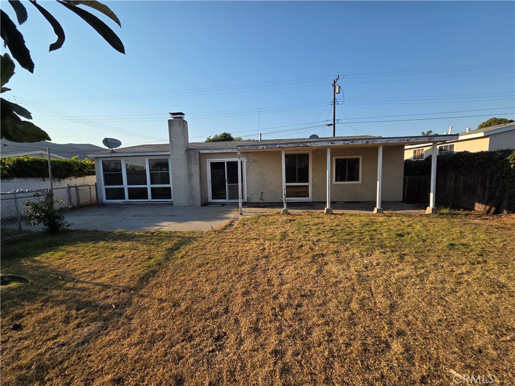 8317 Hudson Drive San Diego, CA 92119 - Photo 19 of 26 a front view of a house with a yard