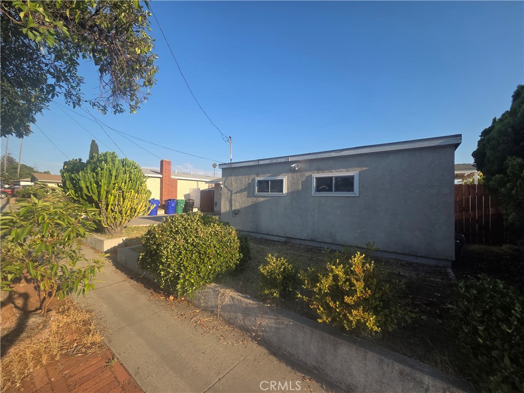 8317 Hudson Drive San Diego, CA 92119 - Photo 23 of 26 a view of a backyard