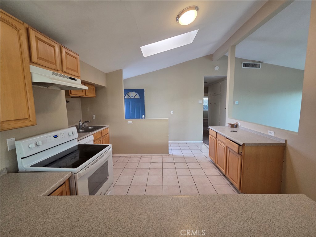 8317 Hudson Drive San Diego, CA 92119 - Photo 5 of 26 a bed room with a bed and a table