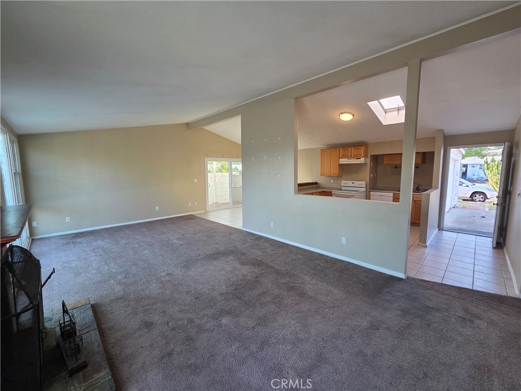 8317 Hudson Drive San Diego, CA 92119 - Photo 7 of 26 wooden floor in an empty room with a window