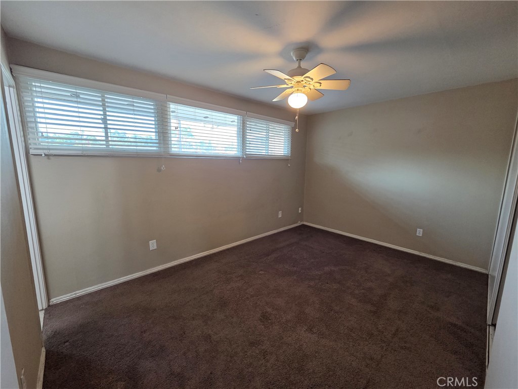 8317 Hudson Drive San Diego, CA 92119 - Photo 10 of 26 an empty room with a window