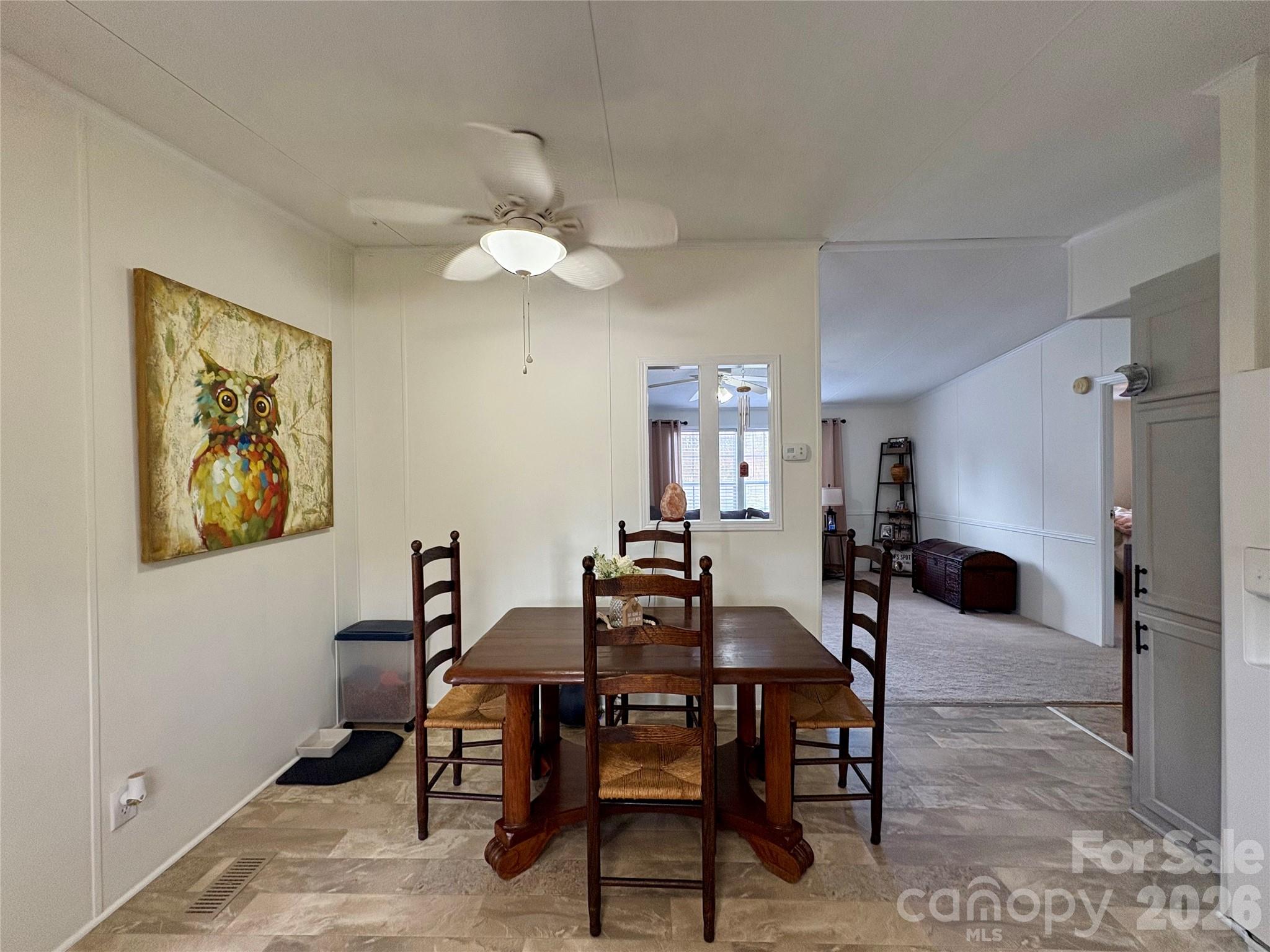 3422 Edwards Road Wingate, NC 28174 - Photo 13 of 31 a view of a dining room with furniture and a chandelier