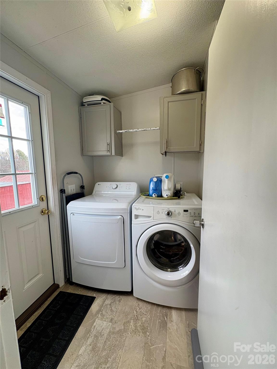 3422 Edwards Road Wingate, NC 28174 - Photo 31 of 31 a utility room with sink dryer and washer