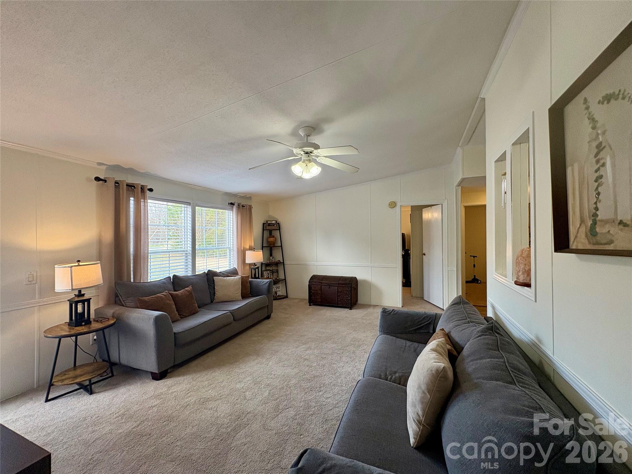 3422 Edwards Road Wingate, NC 28174 - Photo 7 of 31 a living room with furniture and a large window