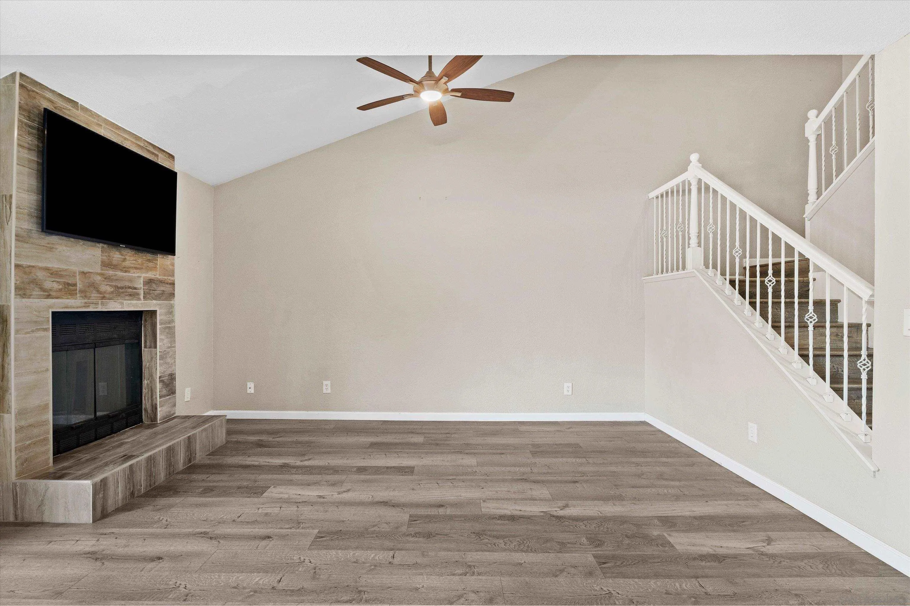5636 Boot Way Oceanside, CA 92057 - Photo 11 of 36 a view of a livingroom with an empty space and a fireplace