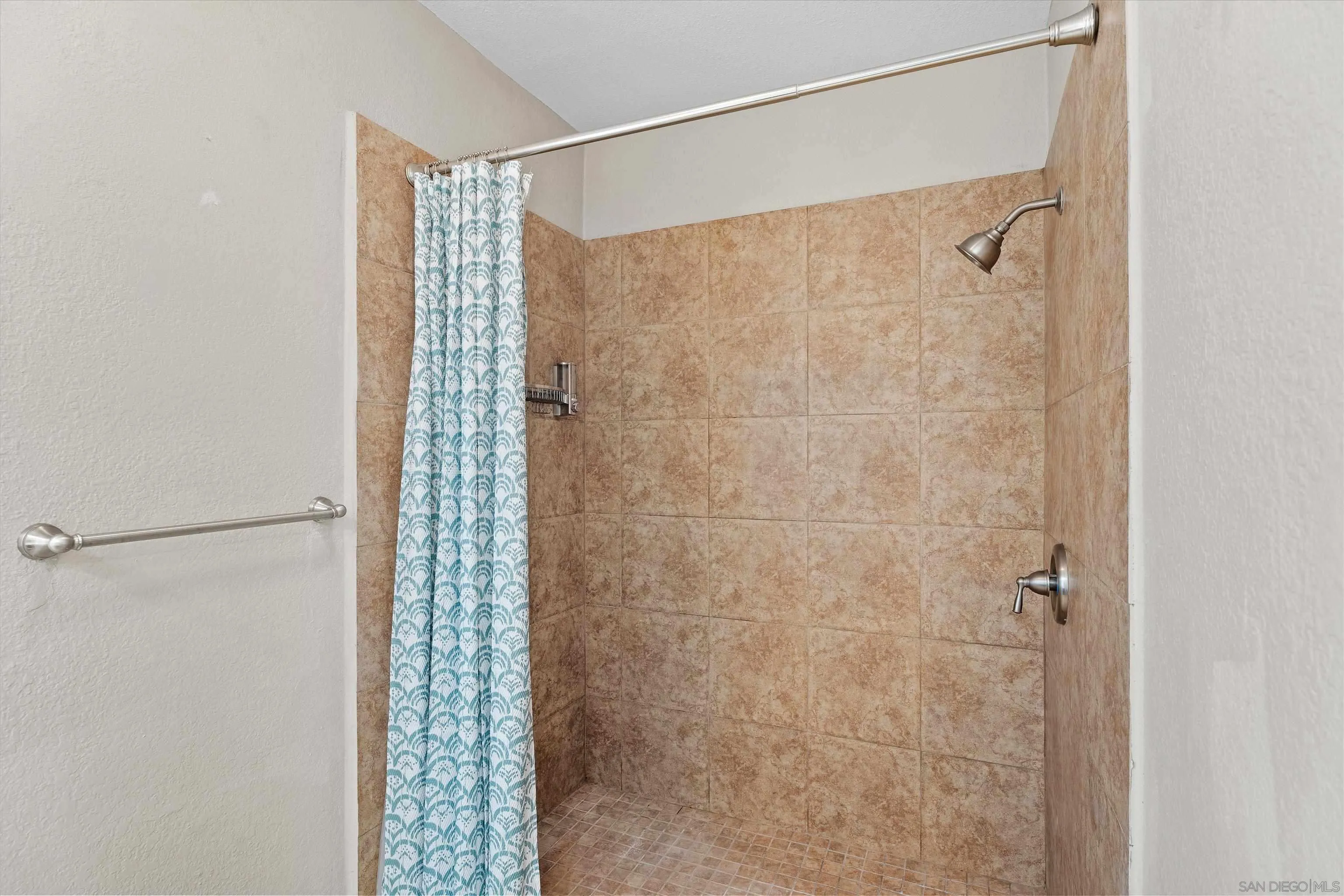 5636 Boot Way Oceanside, CA 92057 - Photo 19 of 36 a bathroom with a glass shower door