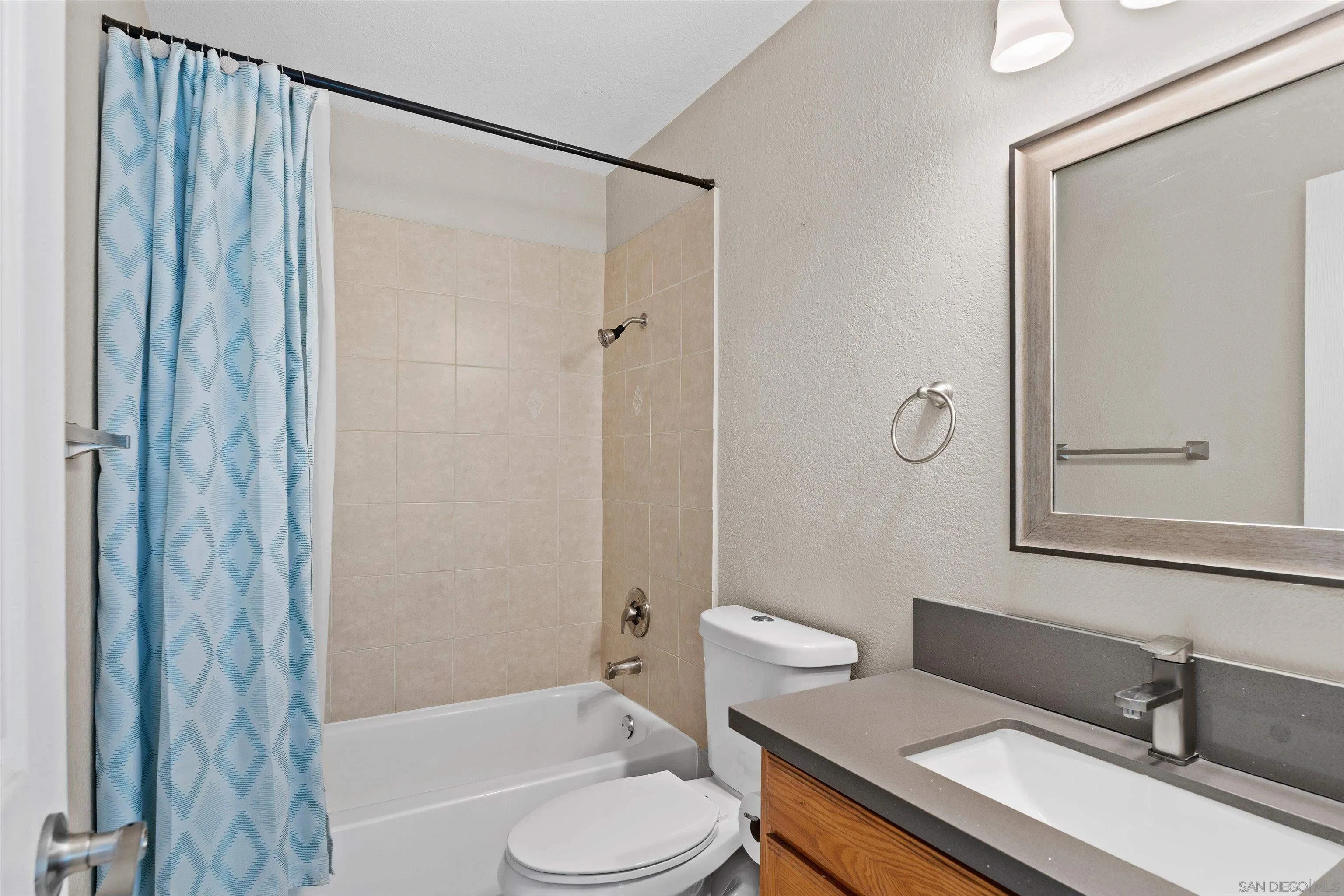 5636 Boot Way Oceanside, CA 92057 - Photo 22 of 36 a bathroom with a sink toilet and shower