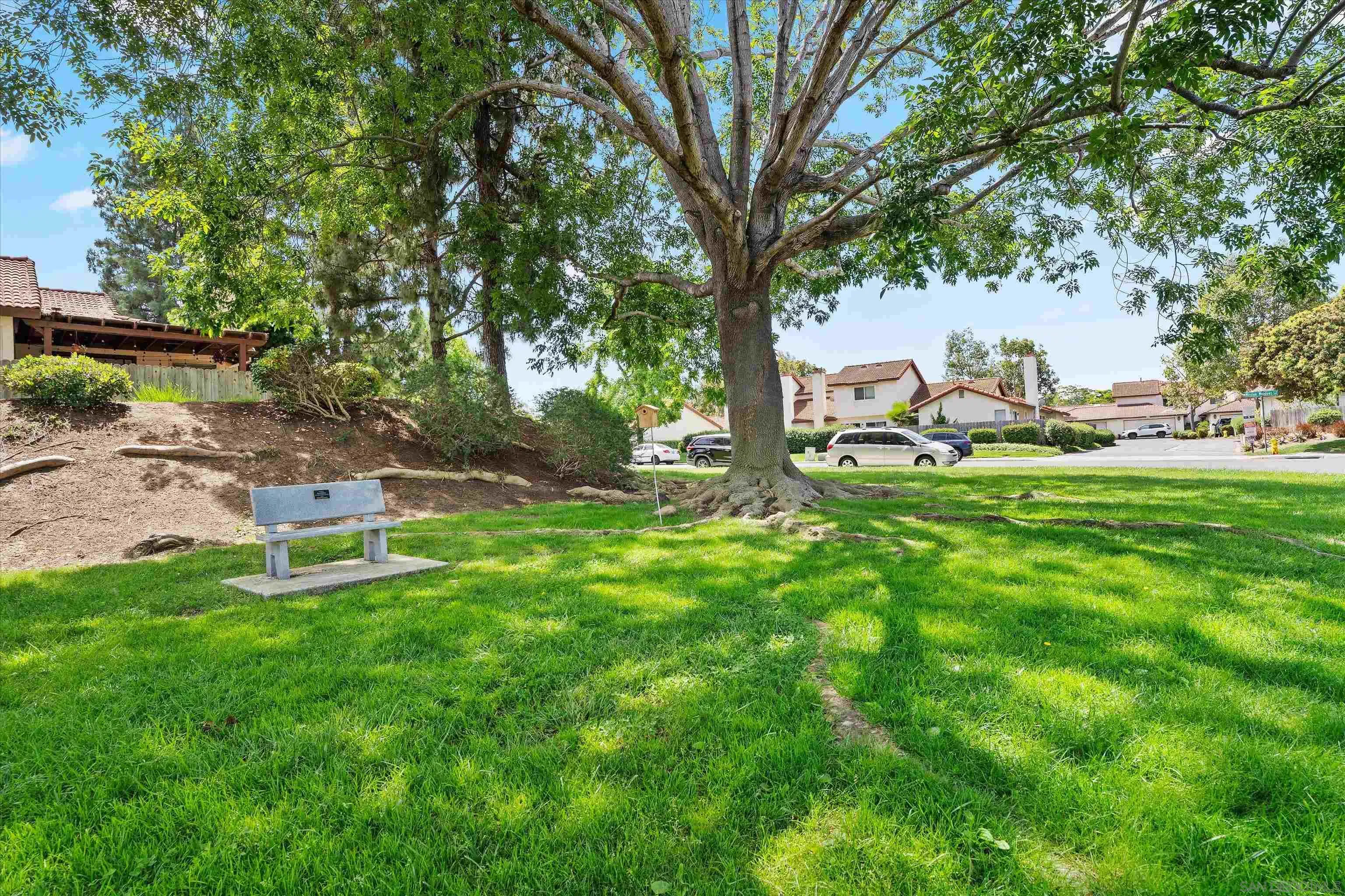 5636 Boot Way Oceanside, CA 92057 - Photo 30 of 36 a backyard of a house with table and chairs