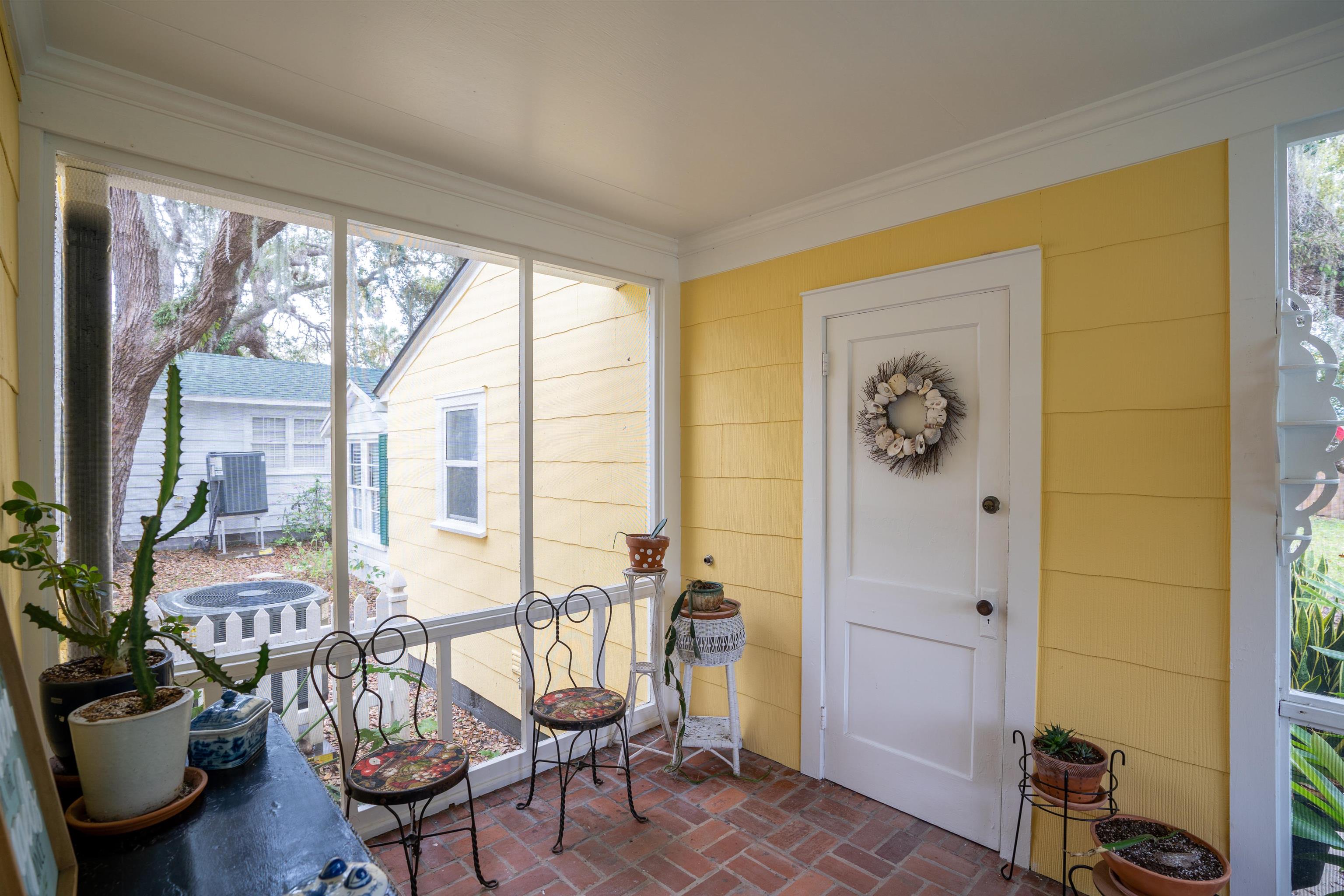 237 Rainey Avenue St. Augustine, FL 32084 - Photo 20 of 26 a view of a livingroom with furniture and windows