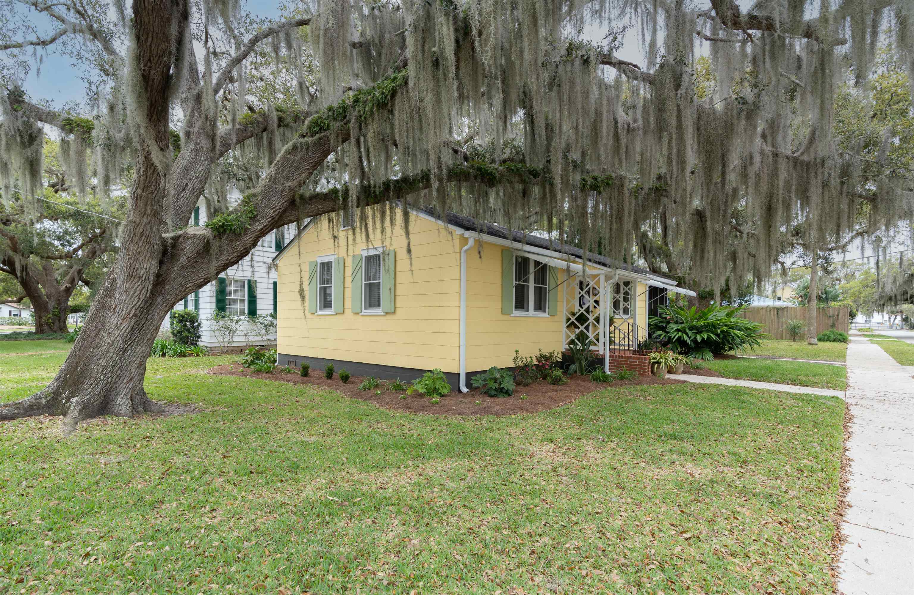 237 Rainey Avenue St. Augustine, FL 32084 - Photo 21 of 26 a view of a house with a yard