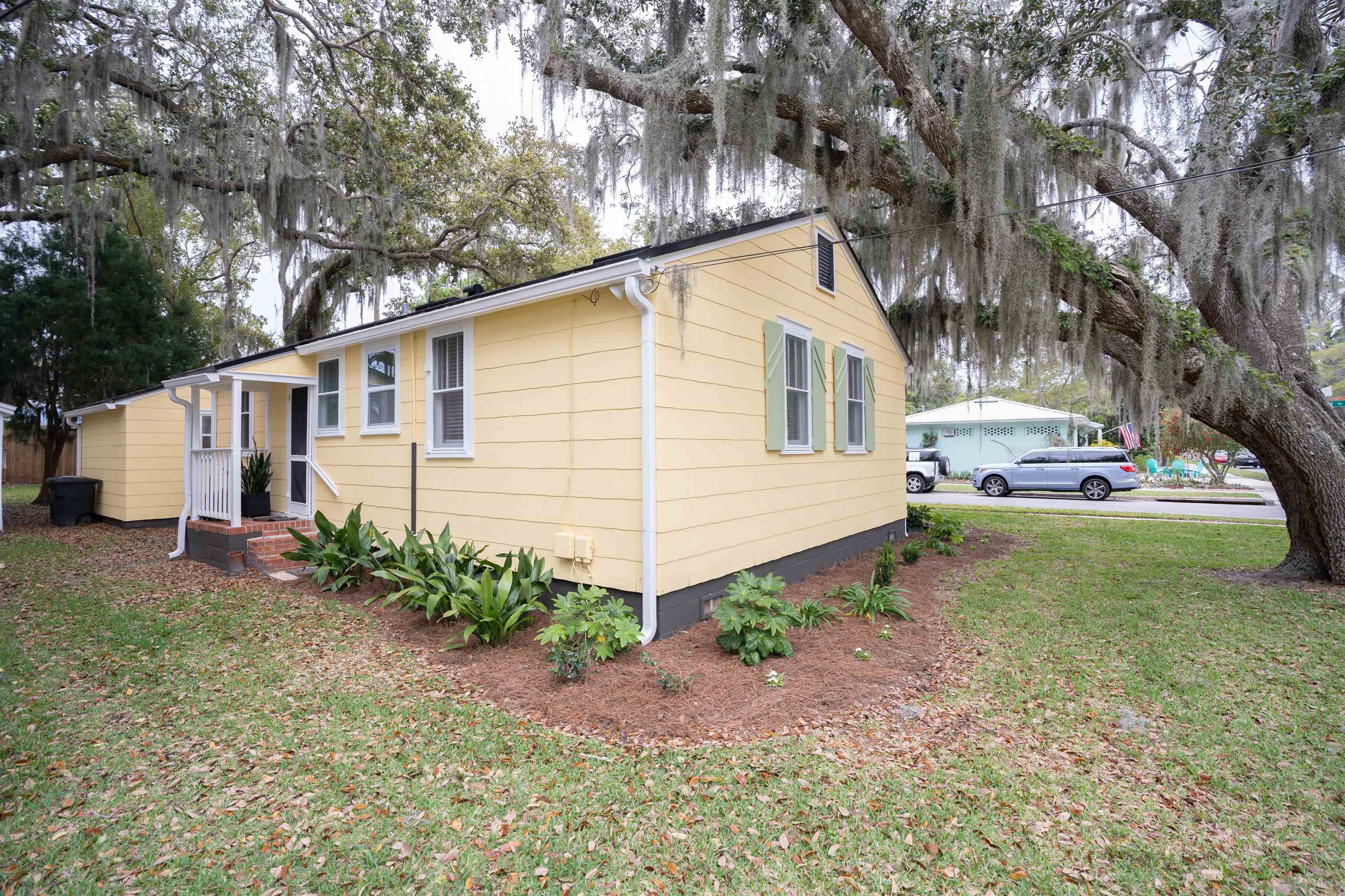 237 Rainey Avenue St. Augustine, FL 32084 - Photo 22 of 26 a view of a house with a yard and pathway