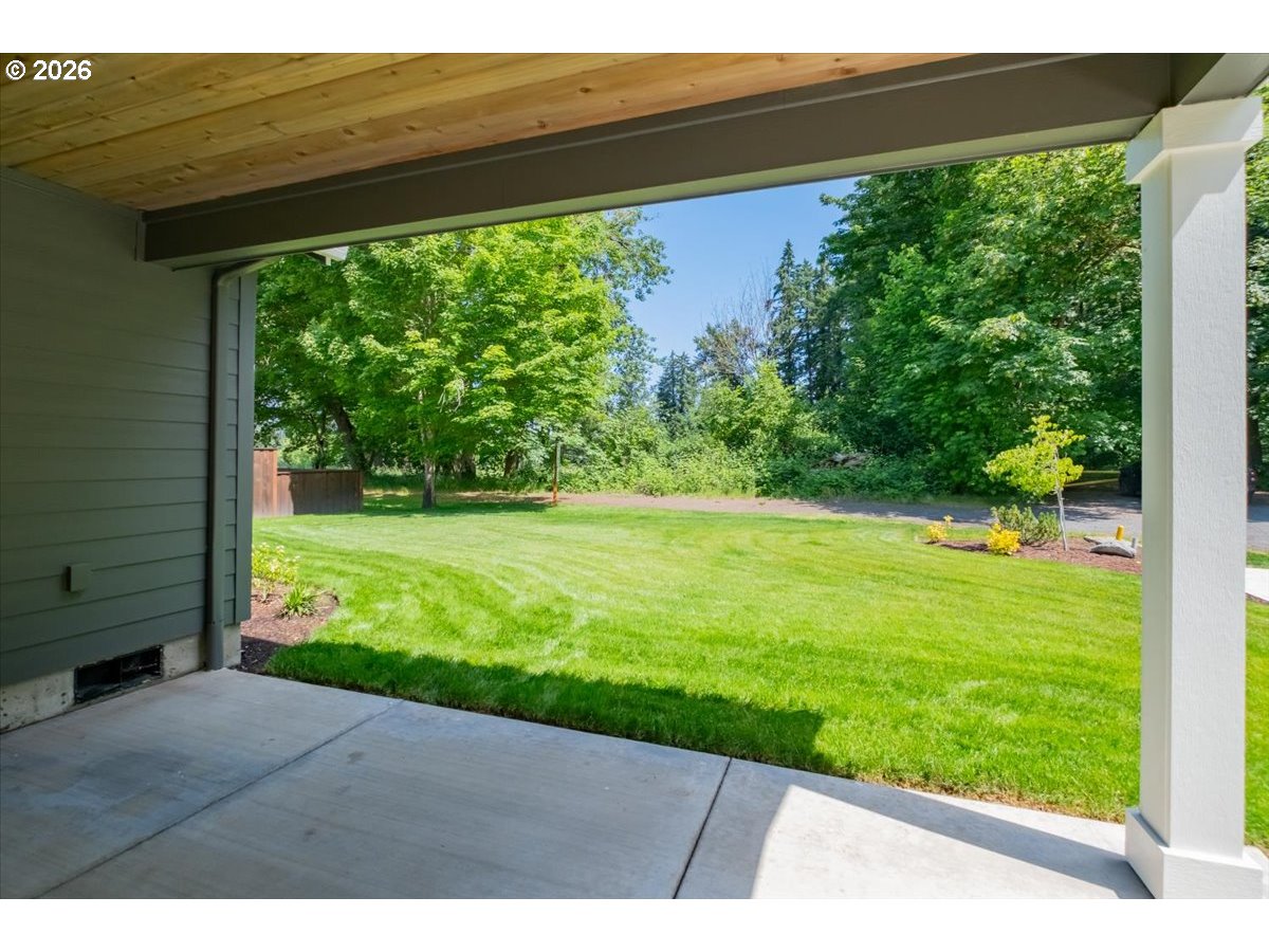 2147 Northeast Spitz Road Canby, OR 97013 - Photo 41 of 48 a view of a yard with an outdoor space