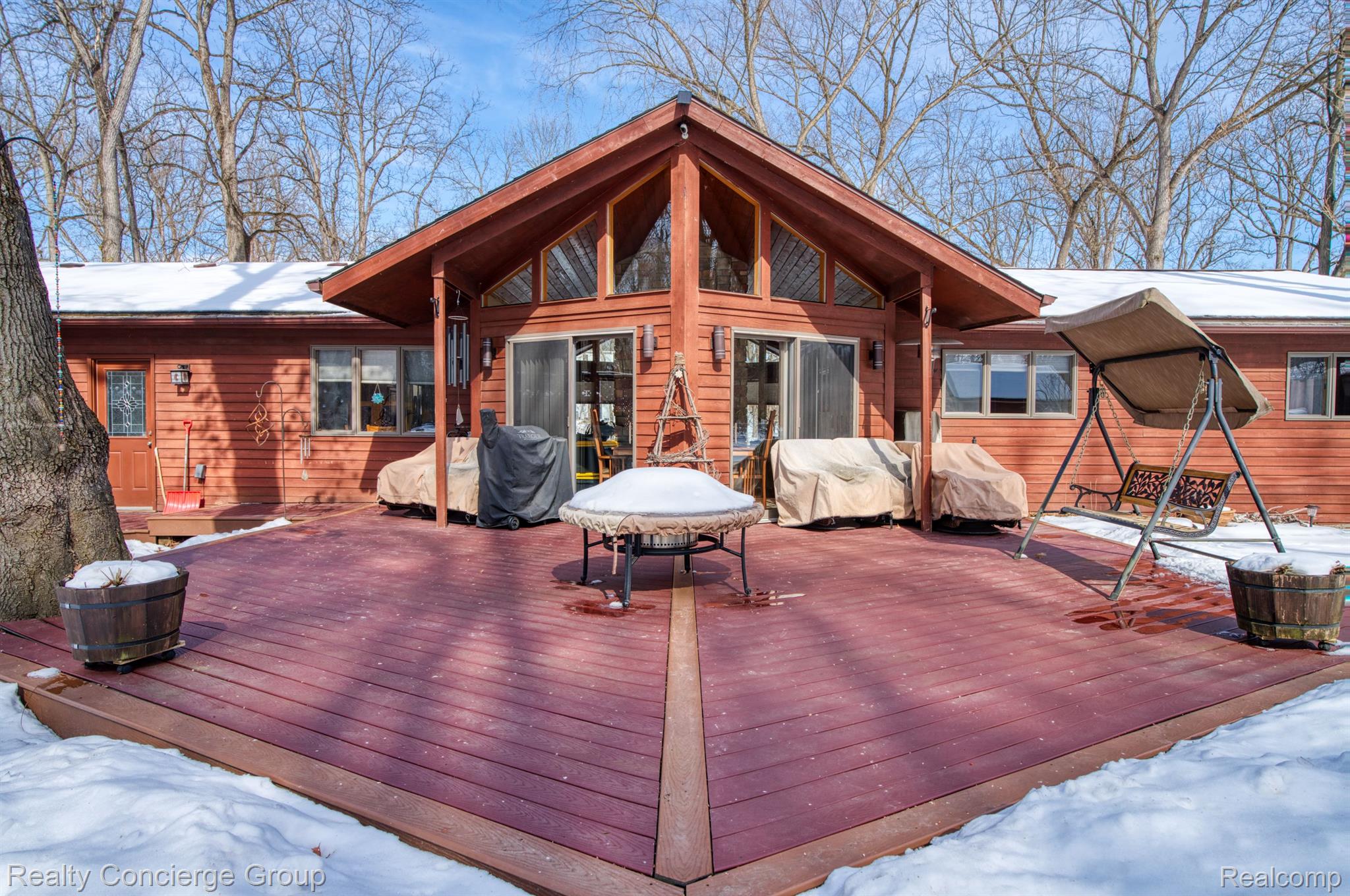 7170 Cowell Road Brighton, MI 48116 - Photo 28 of 38 New Trex decking offers incredible outdoor space