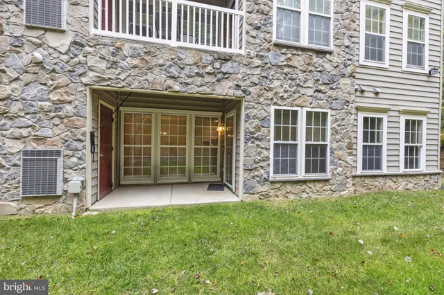 a view of a park with houses