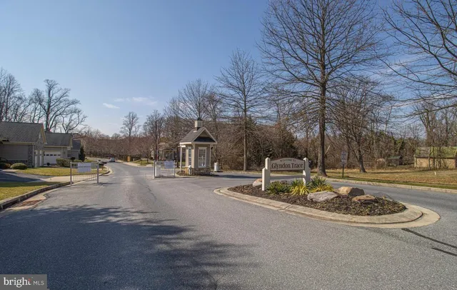 a view of a house with a street