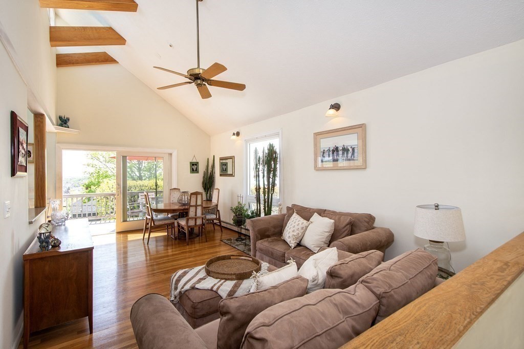 7 Bluff Road Hull, MA 02045 - Photo 13 of 35 a living room with furniture ceiling fan and a window