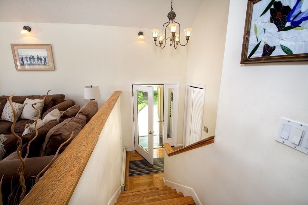 7 Bluff Road Hull, MA 02045 - Photo 22 of 35 a view of a room with wooden floor and windows