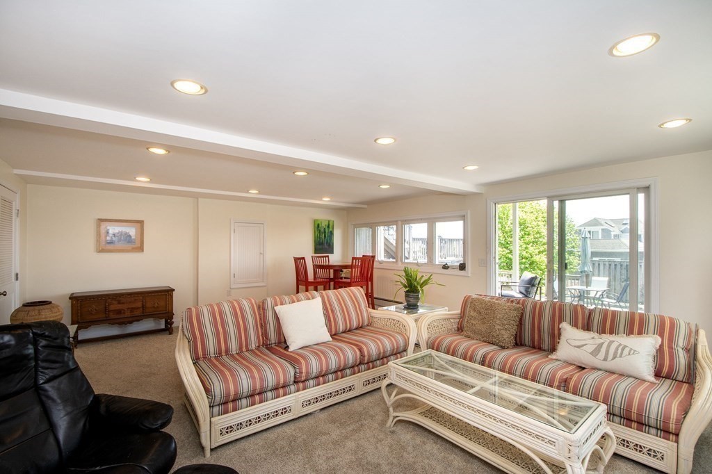 7 Bluff Road Hull, MA 02045 - Photo 26 of 35 a living room with furniture and a large window