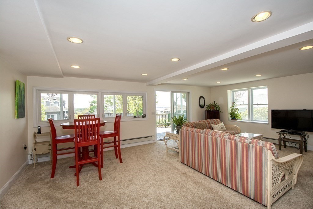 7 Bluff Road Hull, MA 02045 - Photo 27 of 35 a view of a dining room with furniture window and outside view